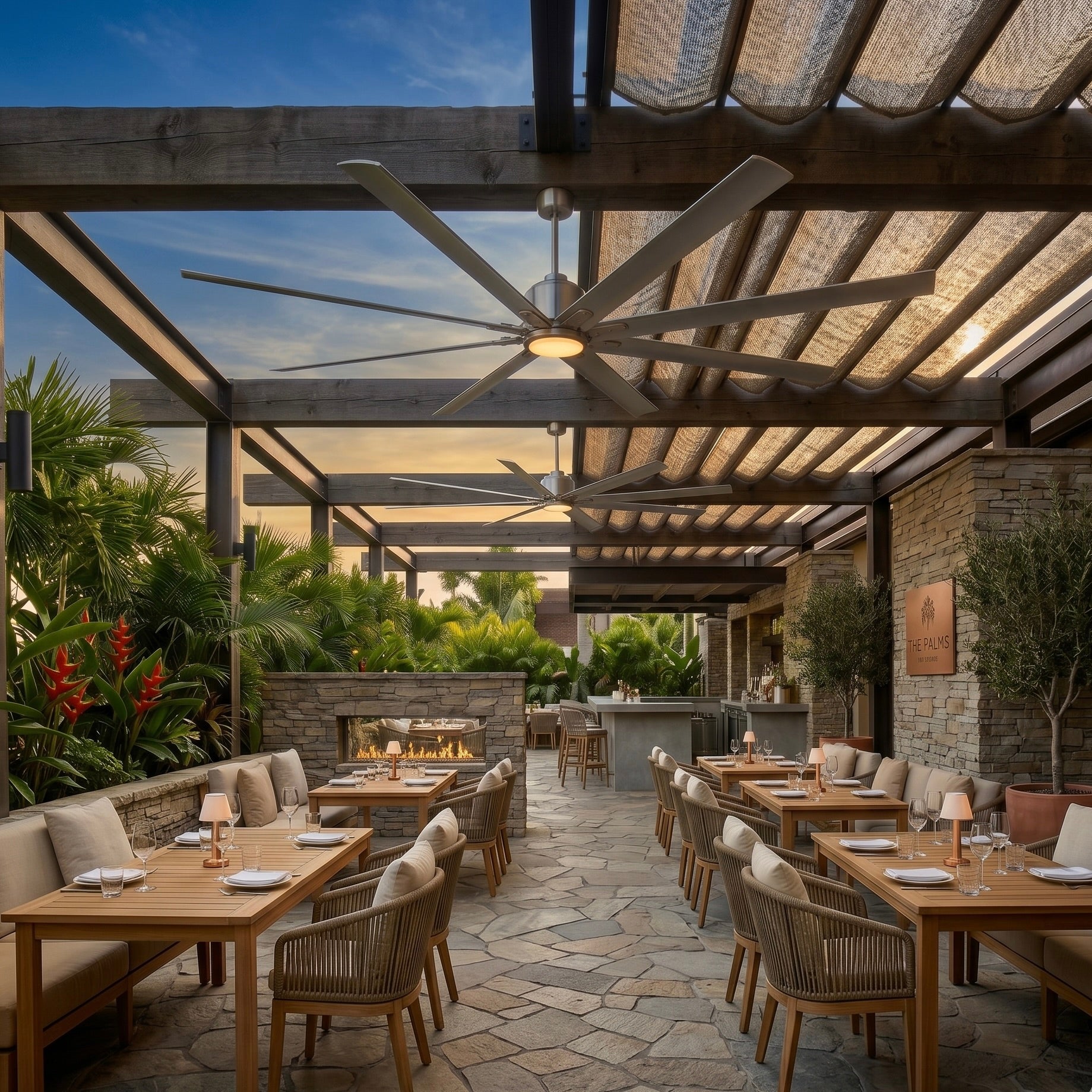 Orca H₂O® extra-large ceiling fan with light in a restaurant setting