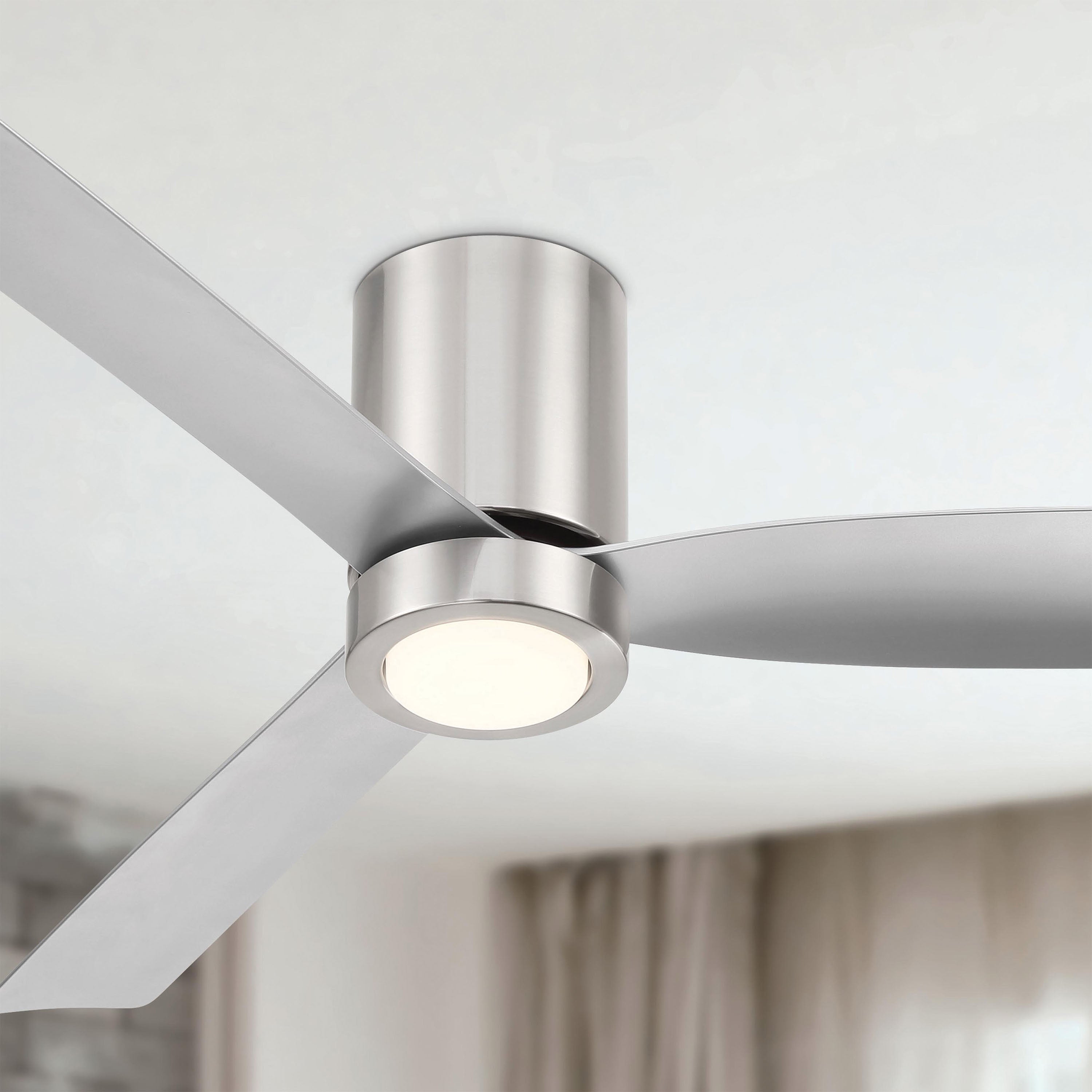 Cormac Ceiling fan with light fixture on a neutral background