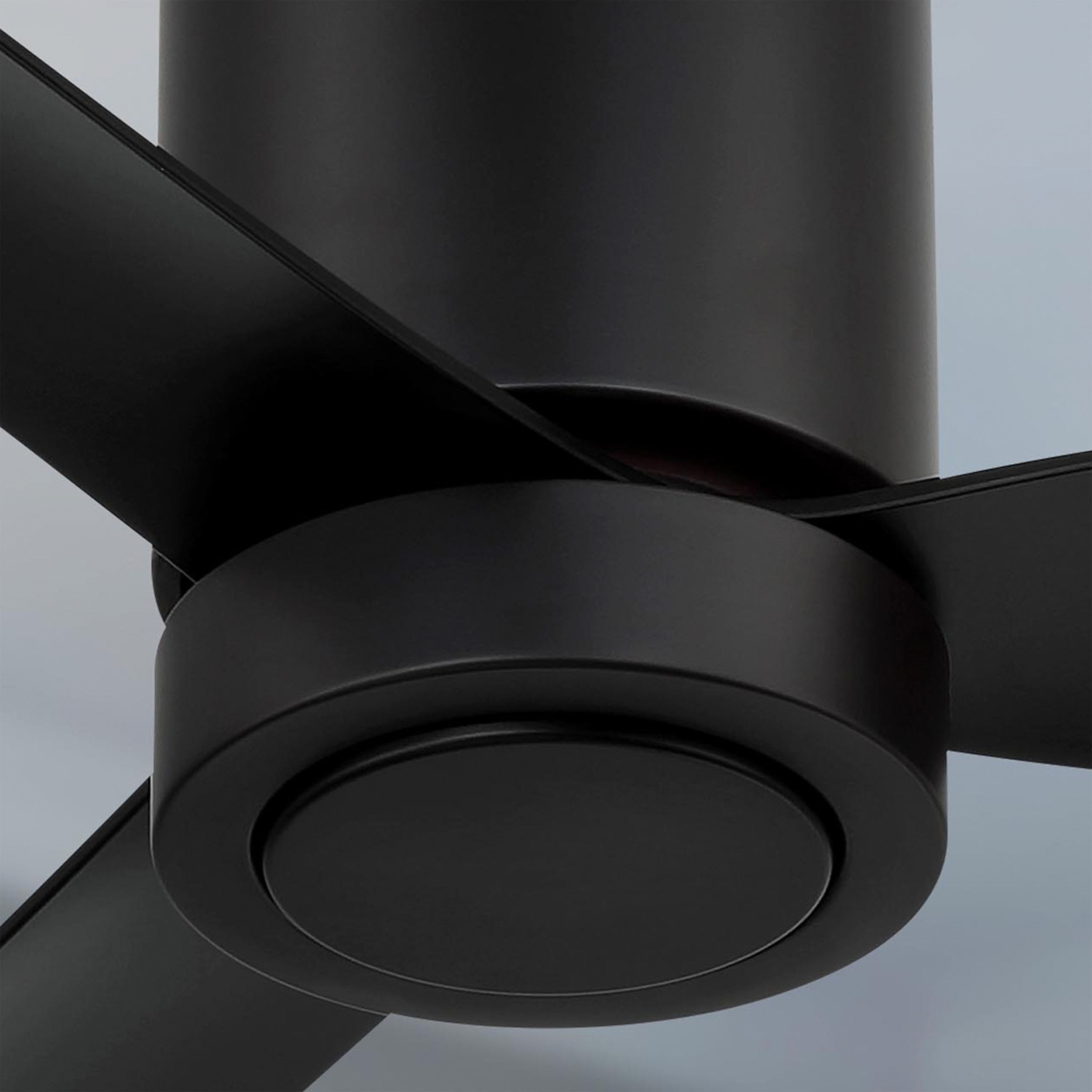 Close-up of cormac 3 blade black ceiling fan against a neutral background