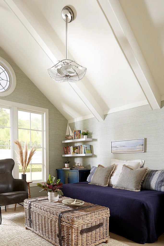 Living room scene with furniture and a steep open ceiling - Arranmore Fandalier shown on the ceiling. 