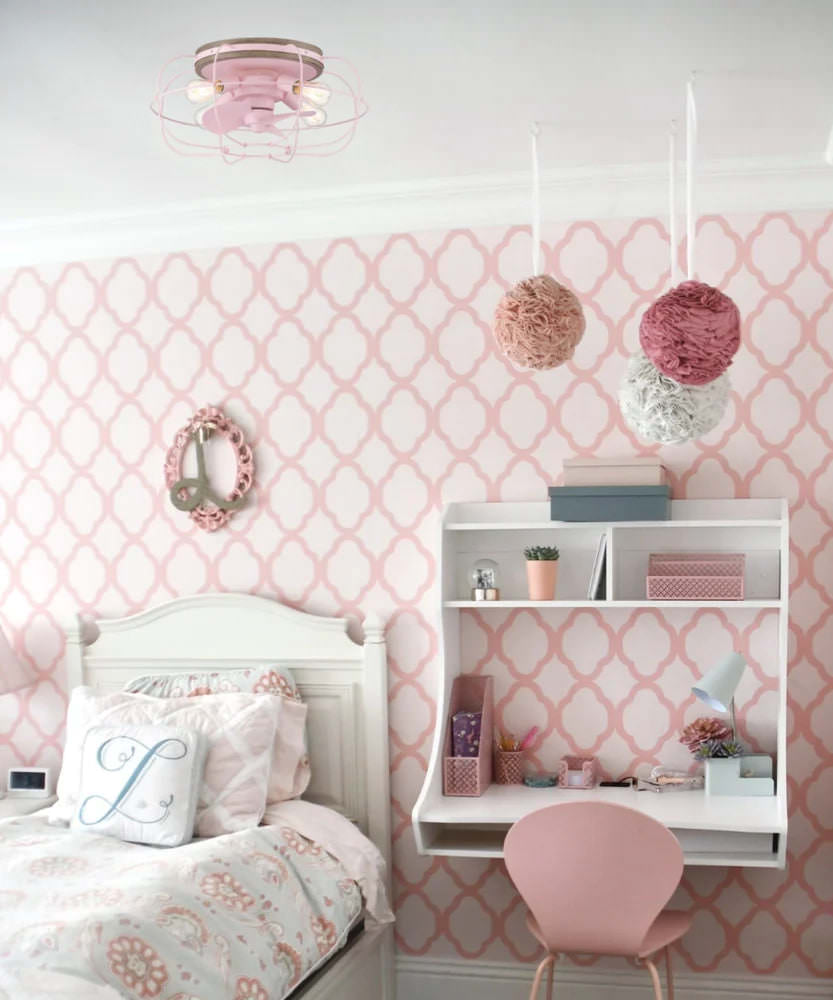 A pink designed room features a pink Arranmore caged fandalier ceiling fan in a pink design.