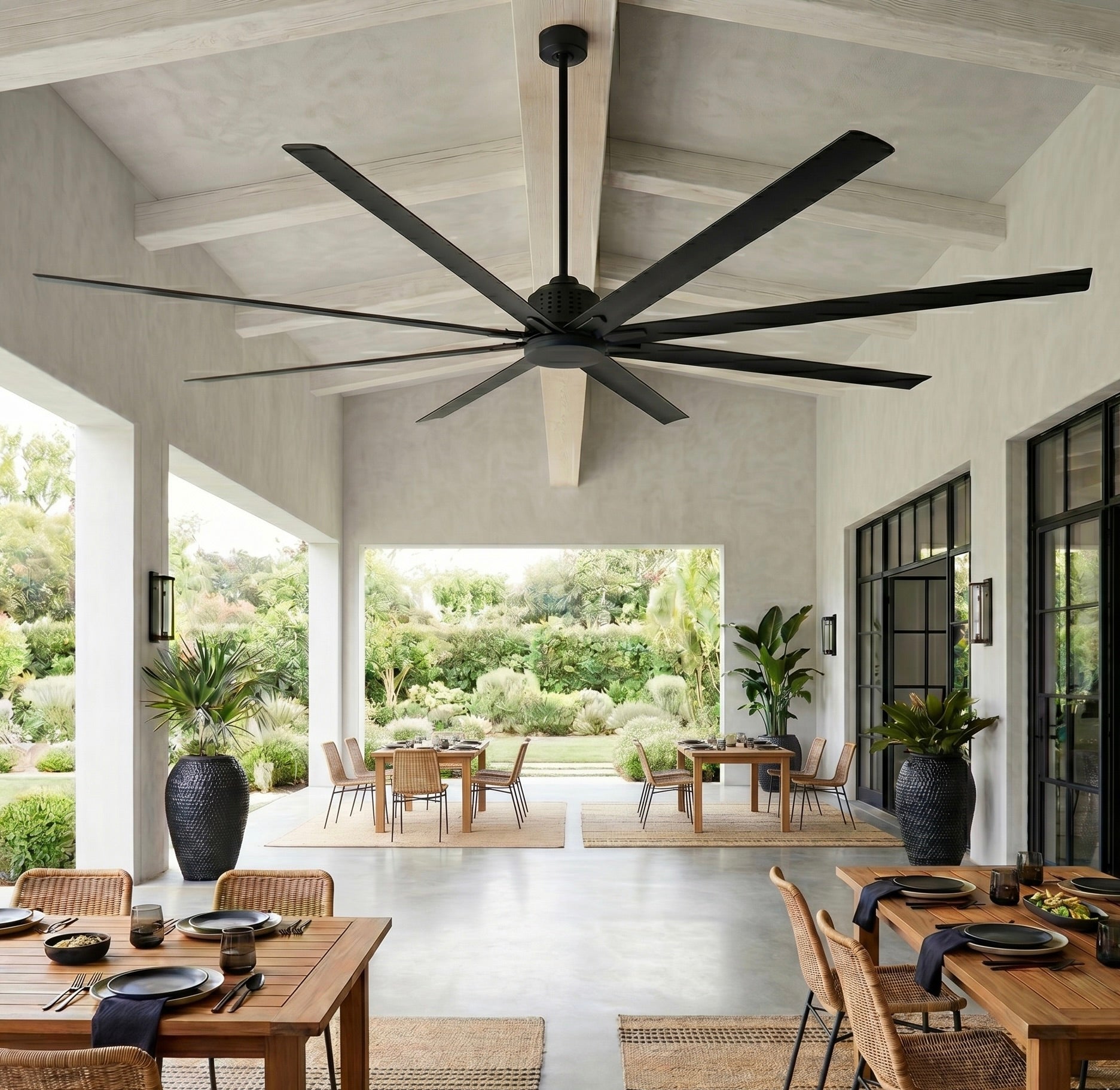 ORCA H₂O® 120" Matte Black ceiling fan in commercial restaurant space