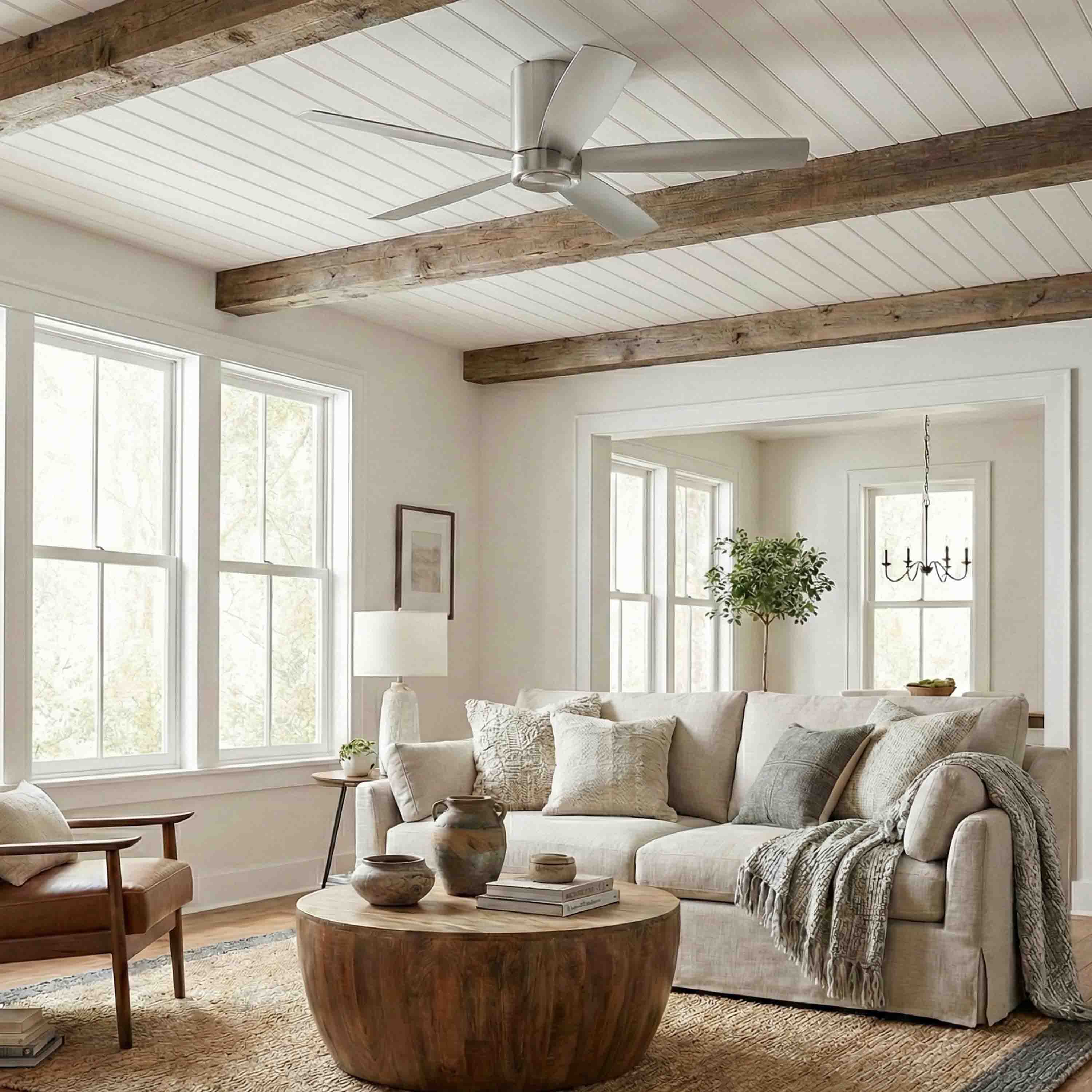 living room featuring CORMAC® 52" Low-Profile Ceiling Fan in brushed nickel