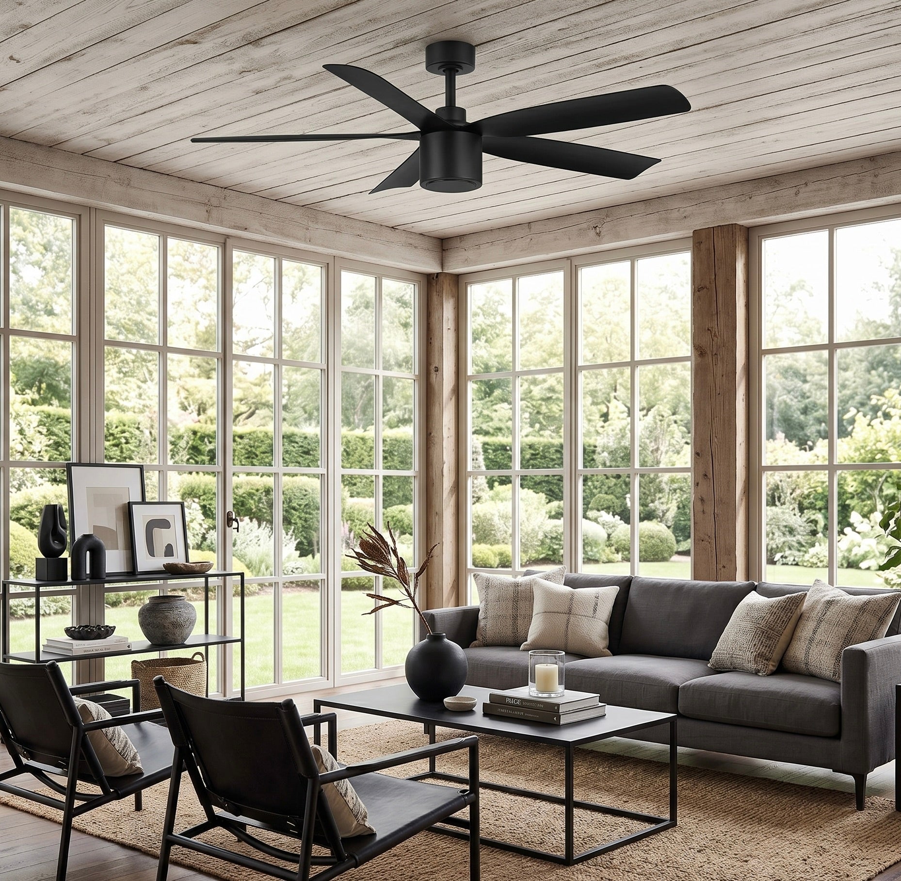 three season room featuring RAVIAN® 52" 5-Blade Ceiling Fan in matte black with no light