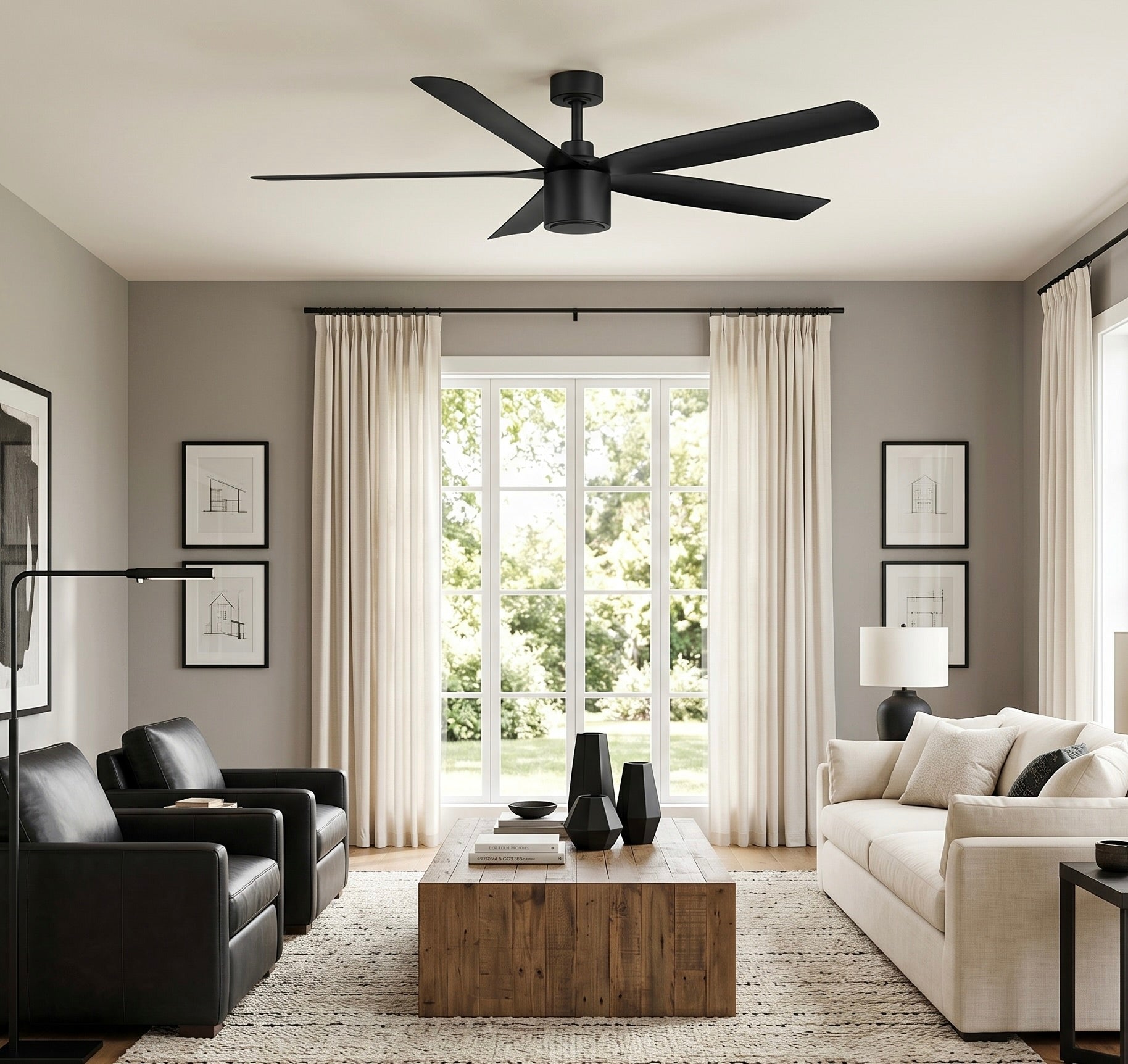 living room featuring RAVIAN® 60" 5-Blade Ceiling Fan in matte black