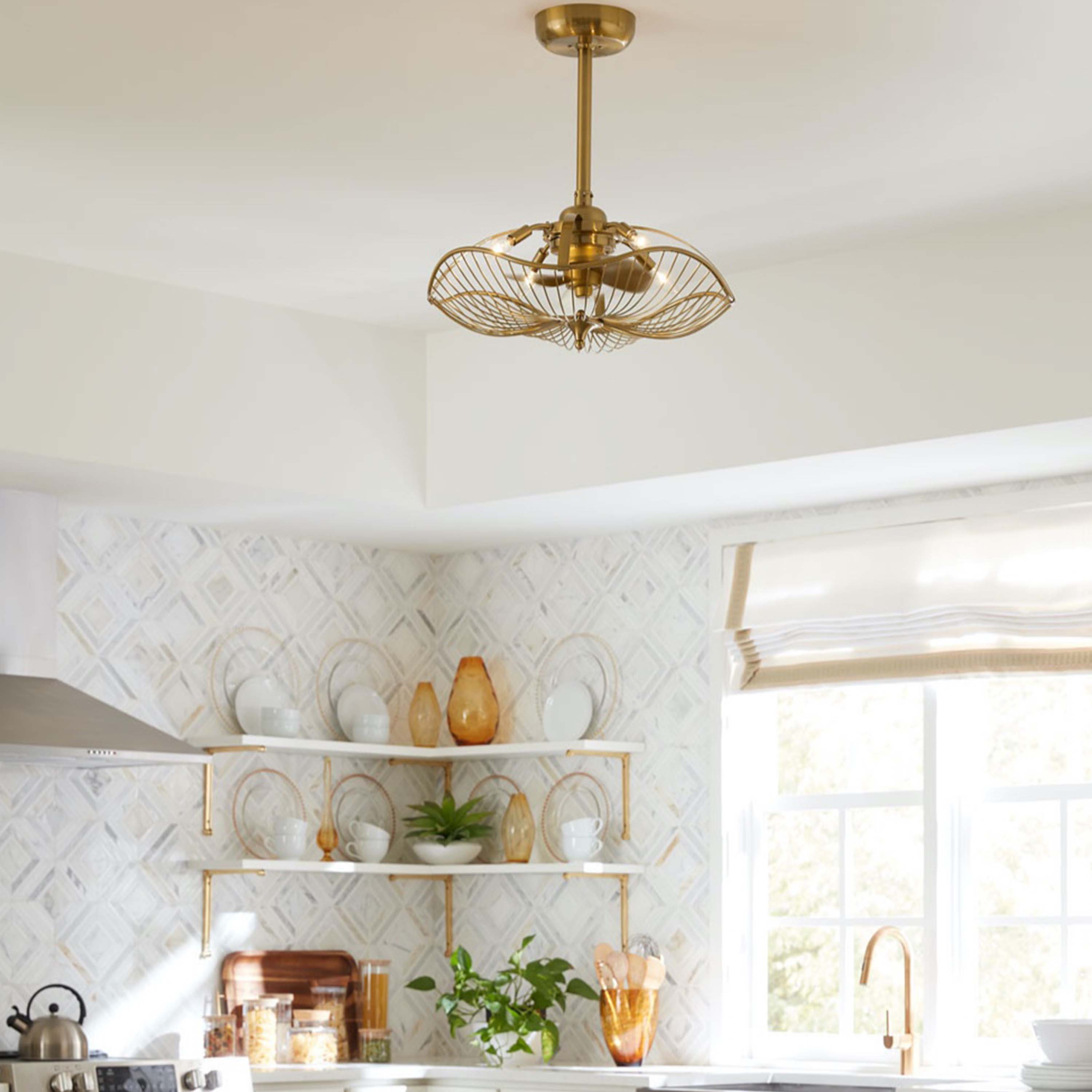 kitchen featuring AURI™ Fandelier, a 22inch Ceiling Fan in Aged Brass